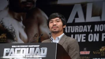 Sep 3, 2014; Los Angeles, CA, USA; Manny Pacquiao poses at press conference at Hyatt Regency Century Plaza Hotel in advance of World Welterweight Championship bout against Chris Algieri (not pictured) on Nov. 22, 2014. Mandatory Credit: Kirby Lee-USA TODAY Sports
