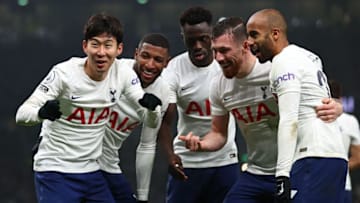Tottenham Hotspur's South Korean striker Son Heung-Min (L) celebrates with teammates after scoring their third goal during the English Premier League football match between Tottenham Hotspur and Crystal Palace at Tottenham Hotspur Stadium in London, on December 26, 2021. - - RESTRICTED TO EDITORIAL USE. No use with unauthorized audio, video, data, fixture lists, club/league logos or 'live' services. Online in-match use limited to 120 images. An additional 40 images may be used in extra time. No video emulation. Social media in-match use limited to 120 images. An additional 40 images may be used in extra time. No use in betting publications, games or single club/league/player publications. (Photo by Adrian DENNIS / AFP) / RESTRICTED TO EDITORIAL USE. No use with unauthorized audio, video, data, fixture lists, club/league logos or 'live' services. Online in-match use limited to 120 images. An additional 40 images may be used in extra time. No video emulation. Social media in-match use limited to 120 images. An additional 40 images may be used in extra time. No use in betting publications, games or single club/league/player publications. / RESTRICTED TO EDITORIAL USE. No use with unauthorized audio, video, data, fixture lists, club/league logos or 'live' services. Online in-match use limited to 120 images. An additional 40 images may be used in extra time. No video emulation. Social media in-match use limited to 120 images. An additional 40 images may be used in extra time. No use in betting publications, games or single club/league/player publications. (Photo by ADRIAN DENNIS/AFP via Getty Images)