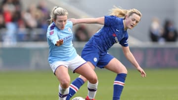 MANCHESTER, ENGLAND - FEBRUARY 23: Lauren Hemp of Manchester City and Erin Cuthbert of Chelsea on the ball during the Barclays FA Women's Super League match between Manchester City and Chelsea at The Academy Stadium on February 23, 2020 in Manchester, United Kingdom. (Photo by Charlotte Tattersall/Getty Images)