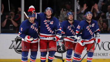 NEW YORK, NY - MAY 07: Brad Richards #19 of the New York Rangers celebrates with teammate Dan Girardi #5 after scoring a goal to tie up the game late in the third period against Braden Holtby #70 of the Washington Capitals in Game Five of the Eastern Conference Semifinals during the 2012 NHL Stanley Cup Playoffs at Madison Square Garden on May 7, 2012 in New York City. (Photo by Bruce Bennett/Getty Images)