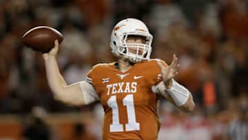 AUSTIN, TX - NOVEMBER 24: Sam Ehlinger #11 of the Texas Longhorns throws a pass in the third quarter against the Texas Tech Red Raiders at Darrell K Royal-Texas Memorial Stadium on November 24, 2017 in Austin, Texas. (Photo by Tim Warner/Getty Images)