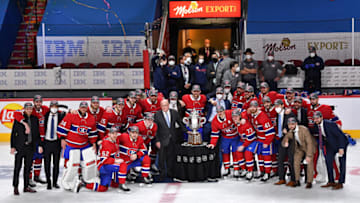 MONTREAL, QUEBEC - JUNE 24: The Montreal Canadiens pose with the Clarence S. Campbell Bowl after defeating the Vegas Golden Knights 3-2 during the first overtime period in Game Six of the Stanley Cup Semifinals of the 2021 Stanley Cup Playoffs at Bell Centre on June 24, 2021 in Montreal, Quebec. (Photo by Minas Panagiotakis/Getty Images)