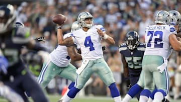 Aug 25, 2016; Seattle, WA, USA; Dallas Cowboys quarterback Dak Prescott (4) passes against the Seattle Seahawks during the first half of an NFL football game at CenturyLink Field. Mandatory Credit: Kirby Lee-USA TODAY Sports