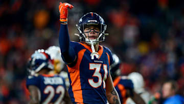 DENVER, CO - DECEMBER 1: Justin Simmons #31 of the Denver Broncos celebrates after a fourth quarter defensive stop against the Los Angeles Chargers at Empower Field at Mile High on December 1, 2019 in Denver, Colorado. (Photo by Dustin Bradford/Getty Images)