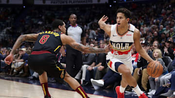 NEW ORLEANS, LOUISIANA - JANUARY 09: Frank Jackson #15 of the New Orleans Pelicans drives the ball around Jordan Clarkson #8 of the Cleveland Cavaliers at Smoothie King Center on January 09, 2019 in New Orleans, Louisiana. NOTE TO USER: User expressly acknowledges and agrees that, by downloading and or using this photograph, User is consenting to the terms and conditions of the Getty Images License Agreement. (Photo by Chris Graythen/Getty Images)