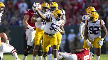 Sep 3, 2016; Green Bay, WI, USA; LSU Tigers linebacker Kendell Beckwith (52) celebrates following a play during the third quarter against the Wisconsin Badgers at Lambeau Field. Mandatory Credit: Jeff Hanisch-USA TODAY Sports