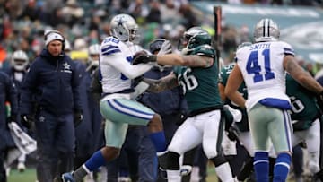 PHILADELPHIA, PA - DECEMBER 31: Wide receiver Dez Bryant #88 of the Dallas Cowboys is pushed out of bounds by defensive end Chris Long #56 of the Philadelphia Eagles during the second half of the game at Lincoln Financial Field on December 31, 2017 in Philadelphia, Pennsylvania. The Dallas Cowboys won 6-0. (Photo by Elsa/Getty Images)