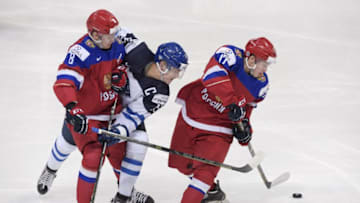 Finland's Mikko Rantanen (C) vies with Minnesota Wild draft picks Andrei Svetlakov (left) and Kirill Kaprizov of Russia during the 2016 IIHF World Junior Ice Hockey Championship final match Finland vs Russia in Helsinki, Finland, on January 5, 2016. / AFP / Lehtikuva / Markku Ulander / RESTRICTED TO EDITORIAL USE (Photo credit should read MARKKU ULANDER/AFP/Getty Images)