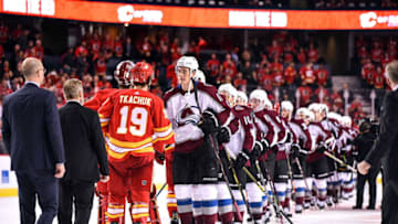 CALGARY, AB - APRIL 19: Calgary Flames Left Wing Matthew Tkachuk (19) and the teammates shake hands with Colorado Avalanche Defenceman Nikita Zadorov (16) and his team after the end of their season following the loss of Game Five of the Western Conference First Round during the 2019 Stanley Cup Playoffs where the Calgary Flames hosted the Colorado Avalanche on April 19, 2019, at the Scotiabank Saddledome in Calgary, AB. (Photo by Brett Holmes/Icon Sportswire via Getty Images)