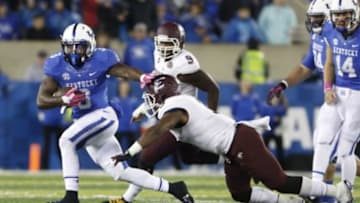 Oct 3, 2015; Lexington, KY, USA; Kentucky Wildcats running back Jojo Kemp (3) runs the ball against the Eastern Kentucky Colonels in second half at Commonwealth Stadium. Kentucky defeated Eastern Kentucky 34-27 in overtime. Mandatory Credit: Mark Zerof-USA TODAY Sports