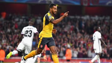 LONDON, ENGLAND - SEPTEMBER 28: Theo Walcott of Arsenal ceclebrates after scoring the opening goal during the UEFA Champions League group A match between Arsenal FC and FC Basel 1893 at the Emirates Stadium on September 28, 2016 in London, England. (Photo by Mike Hewitt/Getty Images)
