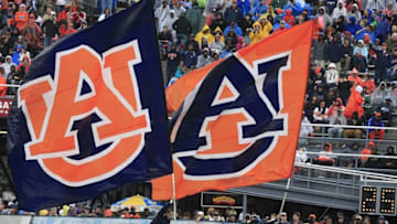Dec 30, 2015; Birmingham, AL, USA; Auburn Tigers cheerleaders fly their flags high after scoring in the 2015 Birmingham Bowl against the Memphis Tigers at Legion Field. Mandatory Credit: Marvin Gentry-USA TODAY Sports