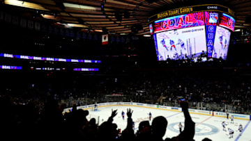 NEW YORK, NEW YORK - OCTOBER 12: Fans celebrate a first-period goal by Kaapo Kakko #24 of the New York Rangers, the first of his NHL career, during a game against the Edmonton Oilers at Madison Square Garden on October 12, 2019 in New York City. (Photo by Emilee Chinn/Getty Images)