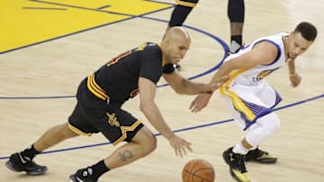June 19, 2016; Oakland, CA, USA; Cleveland Cavaliers forward Richard Jefferson (24) moves the ball against Golden State Warriors guard Stephen Curry (30) in the first half in game seven of the NBA Finals at Oracle Arena. Mandatory Credit: Kelley L Cox-USA TODAY Sports