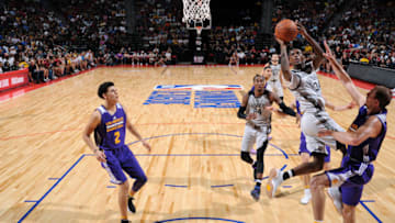 LAS VEGAS, NV - JULY 15: Milton Doyle #34 of the Brooklyn Nets shoots the ball during the game against the Los Angeles Lakers during the Quarterfinals of the 2017 Las Vegas Summer League on July 15, 2017 at the Thomas & Mack Center in Las Vegas, Nevada. NOTE TO USER: User expressly acknowledges and agrees that, by downloading and or using this Photograph, user is consenting to the terms and conditions of the Getty Images License Agreement. Mandatory Copyright Notice: Copyright 2017 NBAE (Photo by Garrett Ellwood/NBAE via Getty Images)