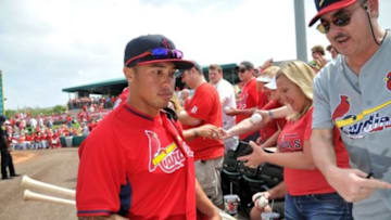 Mar 6, 2015; Jupiter, FL, USA; St. Louis Cardinals second baseman Kolten Wong (16) signs some autographs prior to a spring training baseball game against the Houston Astros at Roger Dean Stadium. Mandatory Credit: Steve Mitchell-USA TODAY Sports