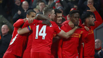LIVERPOOL, ENGLAND - NOVEMBER 26: Divock Origi (2nd R) of Liverpool celebrates scoring the opening goal with his captain Jordan Henderson (14) and his team mates during the Premier League match between Liverpool and Sunderland at Anfield on November 26, 2016 in Liverpool, England. (Photo by Clive Brunskill/Getty Images)