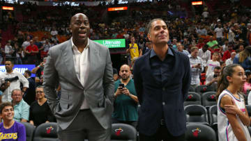 From left, Los Angeles Lakers President Magic Johnson and Lakers General Manager Rob Pelinka talking before the start of the game against the Miami Heat on Sunday, Nov. 18, 2018 at AmericanAirlines Arena in Miami, Fla. (David Santiago/Miami Herald/TNS via Getty Images)