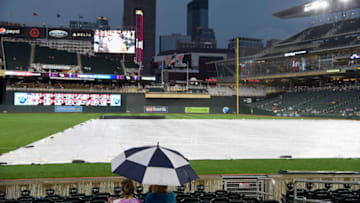 MINNEAPOLIS, MN - AUGUST 16: Fans wait in the stands as rain delays the start of the game between the Minnesota Twins and the Cleveland Indians on August 16, 2017 at Target Field in Minneapolis, Minnesota. (Photo by Hannah Foslien/Getty Images)