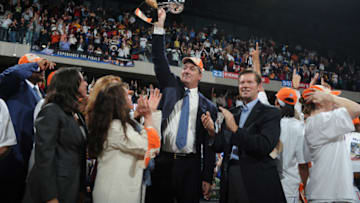 YPSILANTI, MI - OCTOBER 5: Head Coach Bill Laimbeer of the Detroit Shock raises the championship trophy after they win against the San Antonio Silver Stars in Game Three of the WNBA Finals to become WNBA Champions on October 5, 2008 at Eastern Michigan's Convocation Center in Ypsilanti, Michigan. NOTE TO USER: User expressly acknowledges and agrees that, by downloading and/or using this photograph, User is consenting to the terms and conditions of the Getty Images License Agreement. Mandatory Copyright Notice: Copyright 2008 NBAE (Photo by Allen Einstein/NBAE via Getty Images)