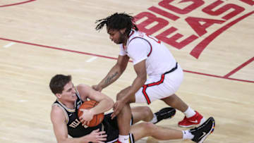 Feb 3, 2021; Queens, New York, USA; Villanova Wildcats guard Collin Gillespie (2) and St. John’s Red Storm guard Posh Alexander (0) fight for a loose ball in the first half at Carnesecca Arena. Mandatory Credit: Wendell Cruz-USA TODAY Sports