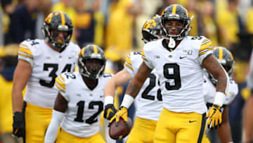 ANN ARBOR, MICHIGAN - OCTOBER 05: Geno Stone #9 of the Iowa Hawkeyes celebrates his first quarter interception against the Michigan Wolverines at Michigan Stadium on October 05, 2019 in Ann Arbor, Michigan. (Photo by Gregory Shamus/Getty Images)
