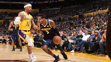 LOS ANGELES, CA - OCTOBER 2: Torrey Craig #3 of the Denver Nuggets handles the ball against the Los Angeles Lakers during a pre-season game on October 2, 2018 at STAPLES Center in Los Angeles, California. NOTE TO USER: User expressly acknowledges and agrees that, by downloading and/or using this Photograph, user is consenting to the terms and conditions of the Getty Images License Agreement. Mandatory Copyright Notice: Copyright 2018 NBAE (Photo by Andrew D. Bernstein/NBAE via Getty Images)