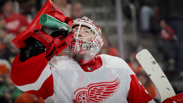 PHILADELPHIA, PENNSYLVANIA - FEBRUARY 16: Jimmy Howard #35 of the Detroit Red Wings takes a drink during a stop in play in the second period against the Philadelphia Flyers at Wells Fargo Center on February 16, 2019 in Philadelphia, Pennsylvania. (Photo by Elsa/Getty Images)