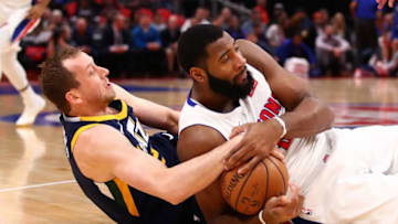 DETROIT, MI - JANUARY 24: Andre Drummond #0 of the Detroit Pistons battles on the floor for the ball with Joe Ingles #2 of the Utah Jazz during the first half at Little Caesars Arena on January 24, 2018 in Detroit, Michigan. NOTE TO USER: User expressly acknowledges and agrees that, by downloading and or using this photograph, User is consenting to the terms and conditions of the Getty Images License Agreement. (Photo by Gregory Shamus/Getty Images)