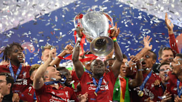 MADRID, SPAIN - JUNE 01: Sadio Mane of Liverpool celebrates with the Champions League Trophy after winning the UEFA Champions League Final between Tottenham Hotspur and Liverpool at Estadio Wanda Metropolitano on June 01, 2019 in Madrid, Spain. (Photo by Matthias Hangst/Getty Images)