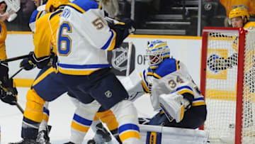 Feb 27, 2016; Nashville, TN, USA; St. Louis Blues goalie Jake Allen (34) looks for the puck before making a save during the first period against the Nashville Predators at Bridgestone Arena. Mandatory Credit: Christopher Hanewinckel-USA TODAY Sports