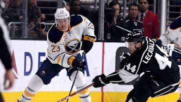 Feb 27, 2016; Los Angeles, CA, USA; Los Angeles Kings center Vincent Lecavalier (44) defends a pass by Buffalo Sabres center Sam Reinhart (23) during the first period of the game at Staples Center. Mandatory Credit: Jayne Kamin-Oncea-USA TODAY Sports