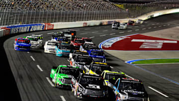 CHARLOTTE, NC - MAY 17: NASCAR Truck Series drivers restart for the final time in the 2019 NC Education Lottery 200 at Charlotte Motor Speedway (Photo by Jared C. Tilton/Getty Images)