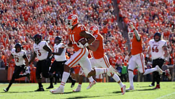 CLEMSON, SC - NOVEMBER 03: Isaiah Simmons #11 of the Clemson Tigers returns an interception for a touchdown against the Louisville Cardinals during their game at Clemson Memorial Stadium on November 3, 2018 in Clemson, South Carolina. (Photo by Streeter Lecka/Getty Images)