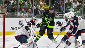 Oct 30, 2023; Dallas, Texas, USA; Columbus Blue Jackets goaltender Elvis Merzlikins (90) stops a shot by Dallas Stars left wing Mason Marchment (27) during the second period at the American Airlines Center. Mandatory Credit: Jerome Miron-USA TODAY Sports
