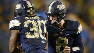 PITTSBURGH, PA - SEPTEMBER 08: Kenny Pickett #8 of the Pittsburgh Panthers hands off to Qadree Ollison #30 of the Pittsburgh Panthers against the Penn State Nittany Lions on September 8, 2018 at Heinz Field in Pittsburgh, Pennsylvania. (Photo by Justin K. Aller/Getty Images)