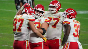 Nov 22, 2020; Paradise, Nevada, USA; Kansas City Chiefs tight end Travis Kelce (87) celebrates with offensive guard Nick Allegretti (73) offensive guard Andrew Wylie (77) running back Darrel Williams (31) his touchdown pass scored against the Las Vegas Raiders during the second half at Allegiant Stadium. Mandatory Credit: Kirby Lee-USA TODAY Sports