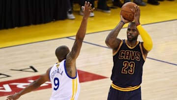 Jun 5, 2016; Oakland, CA, USA; Cleveland Cavaliers forward LeBron James (23) handles the ball against Golden State Warriors forward Andre Iguodala (9) during the second quarter in game two of the NBA Finals at Oracle Arena. Mandatory Credit: Kyle Terada-USA TODAY Sports