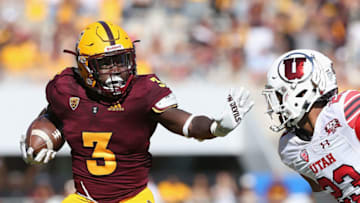 TEMPE, AZ - NOVEMBER 03: Running back Eno Benjamin #3 of the Arizona State Sun Devils rushes the football against the Utah Utes during the first half of the college football game at Sun Devil Stadium on November 3, 2018 in Tempe, Arizona. (Photo by Christian Petersen/Getty Images)