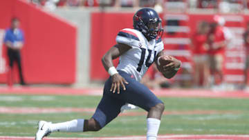 HOUSTON, TX - SEPTEMBER 8: Khalil Tate #14 of the Arizona Wildcats rushes agains the Houston Cougars in the third quarter at TDECU Stadium on September 8, 2018 in Houston, Texas. Houston won 45 to 18. (Photo by Thomas B. Shea/Getty Images)