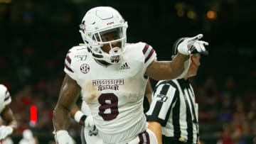 Mississippi State Bulldogs running back Kylin Hill (8) celebrates after a touchdown (Photo by John Korduner/Icon Sportswire via Getty Images)