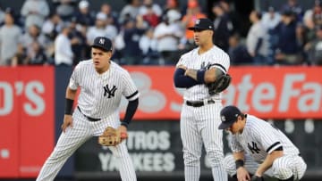 Gio Urshela, Gleyber Torres, DJ LeMahieu, New York Yankees. (Photo by Elsa/Getty Images)