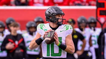 Oct 28, 2023; Salt Lake City, Utah, USA; Oregon Ducks quarterback Bo Nix (10) drops back to pass against the Utah Utes during the first half at Rice-Eccles Stadium. Mandatory Credit: Christopher Creveling-USA TODAY Sports