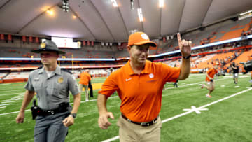 SYRACUSE, NEW YORK - SEPTEMBER 14: Head Coach Dabo Swinney of the Clemson Tigers runs off the field after a game against the Syracuse Orange at the Carrier Dome on September 14, 2019 in Syracuse, New York. (Photo by Bryan M. Bennett/Getty Images)