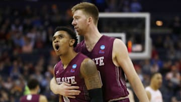 COLUMBUS, OHIO - MARCH 22: Jordan Burns #1 reacts with Will Rayman #10 of the Colgate Raiders during the second half against the Tennessee Volunteers in the first round of the 2019 NCAA Men's Basketball Tournament at Nationwide Arena on March 22, 2019 in Columbus, Ohio. (Photo by Gregory Shamus/Getty Images)