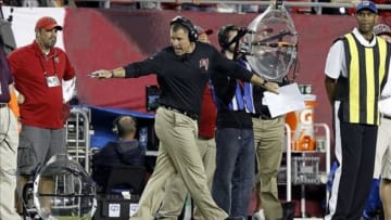 Oct 24, 2013; Tampa, FL, USA; Tampa Bay Buccaneers head coach Greg Schiano reacts against the Carolina Panthers during the second half at Raymond James Stadium. Carolina Panthers defeated the Tampa Bay Buccaneers 31-13. Mandatory Credit: Kim Klement-USA TODAY Sports