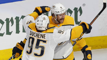 The Nashville Predators celebrate a third period goal by forward Filip Forsberg (9) who scored with less then a minute to play to tie the game with Arizona Coyotes during the Western Conference qualifications at Rogers Place. Mandatory Credit: Perry Nelson-USA TODAY Sports