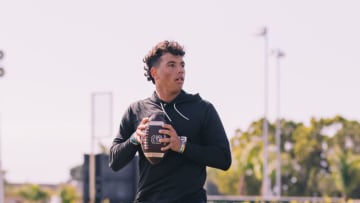 Quarterback Dylan Raiola going through drills (Photo by Aubrey Lao /Getty Images)