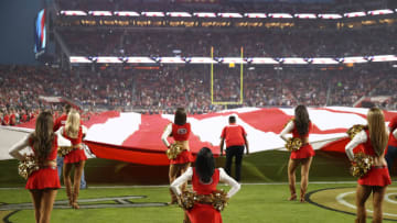 SANTA CLARA, CA - NOVEMBER 12: A San Francisco 49ers Gold Rush cheerleader kneels during the national anthem prior to the NFL game between the San Francisco 49ers and the New York Giants at Levi's Stadium on November 12, 2018 in Santa Clara, California. (Photo by Ezra Shaw/Getty Images)