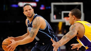 LOS ANGELES, CA - APRIL 21: Deron Williams #8 of the Utah Jazz looks to pass the ball as he is gaurded by Shannon Brown #12 of the Los Angeles Lakers in the first half of Game Two of the Western Conference Quarterfinals during the 2009 NBA Playoffs at Staples Center on April 21, 2009 in Los Angeles, California. NOTE TO USER: User expressly acknowledges and agrees that, by downloading and or using this photograph, User is consenting to the terms and conditions of the Getty Images License Agreement. (Photo by Kevork Djansezian/Getty Images)
